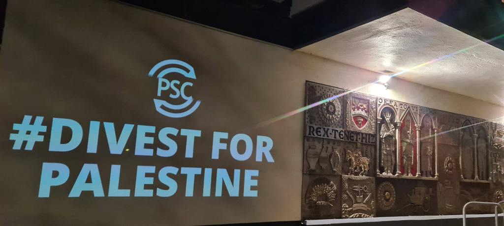 Hitchin Library with the logo of the Palestine Solidarity Campaign and text reading "Divest for Palestine"